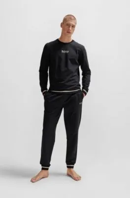 Cotton-terry tracksuit bottoms with logo in signature colors