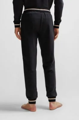 Cotton-terry tracksuit bottoms with logo in signature colors