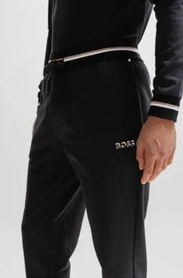 Cotton-terry tracksuit bottoms with logo in signature colors